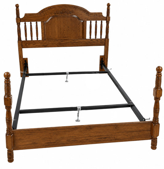 Wooden bed frame with headboard on a white background