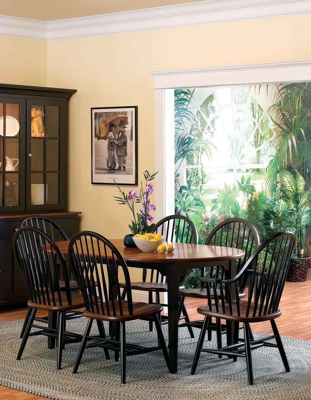 Eight Spindle Bowback Arm Chair