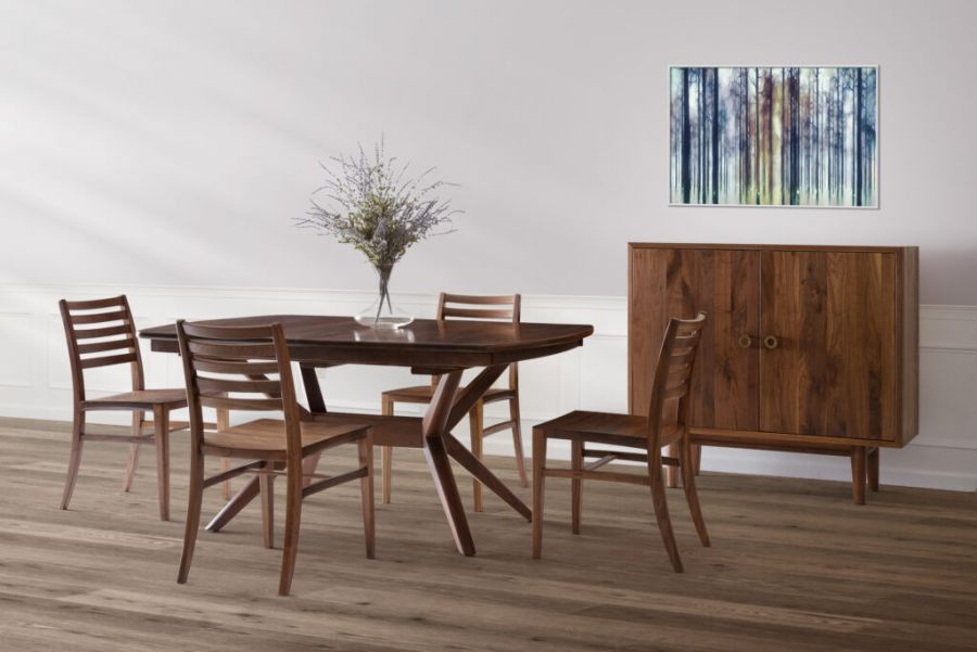 Walnut dining group with four chairs and a cabinet